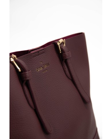 Borsa bordeaux rigida a spalla effetto tigrato con stemma stampato chiusura a clip Borsa bordeaux rigida a spalla effetto tigrato con stemma stampato chiusura a clip